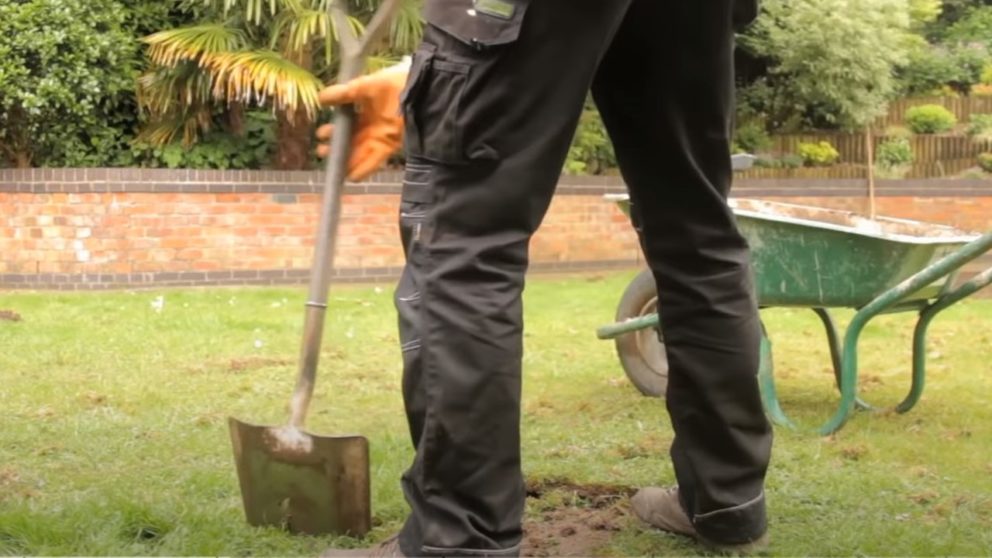 digging-soil-for-diy-grass-project